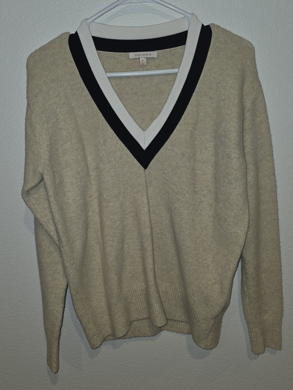 Skies Are Blue Cream V-Neck Sweater with Black Trim
